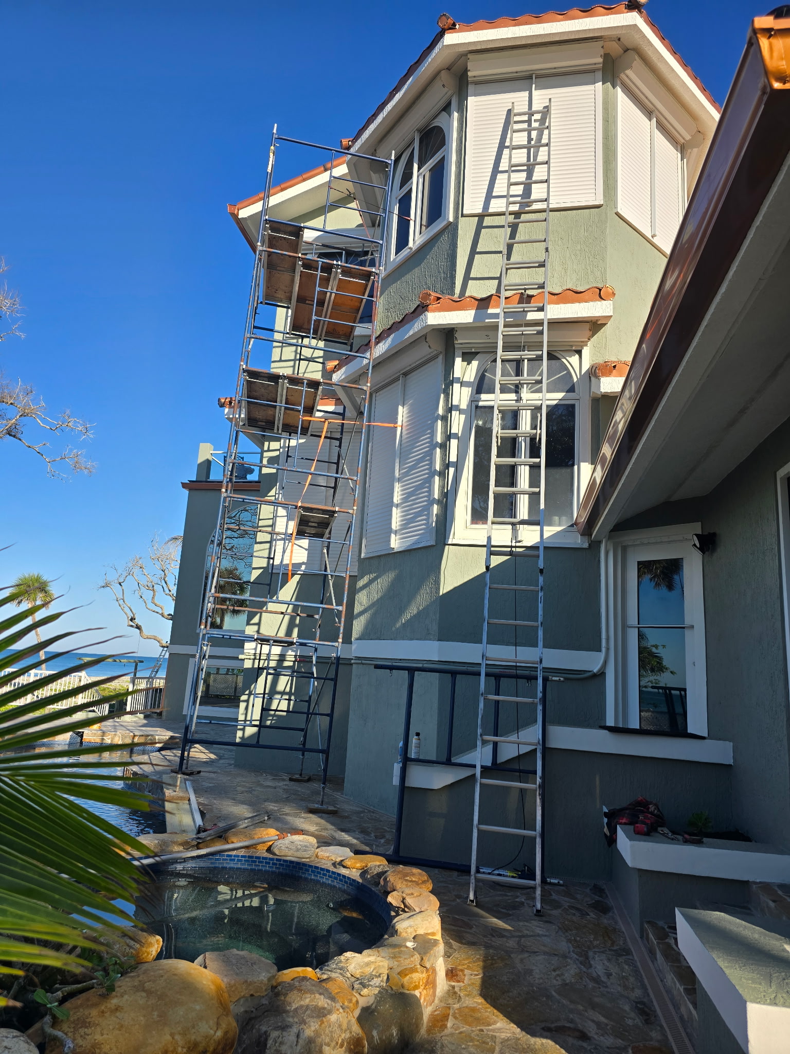 New roll-down hurricane shutters installed on a Southwest Florida home